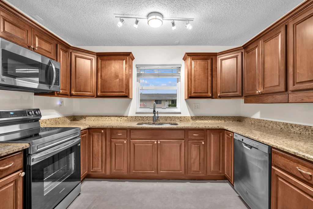 Photo of 3298 Plaza Place, Lake Worth, FL 33462 (MLS # R11131047)