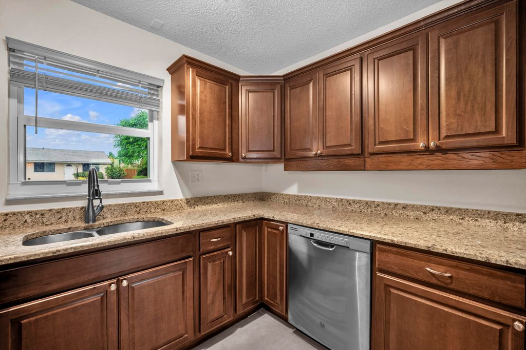 Photo of 3298 Plaza Place, Lake Worth, FL 33462 (MLS # R11131047)