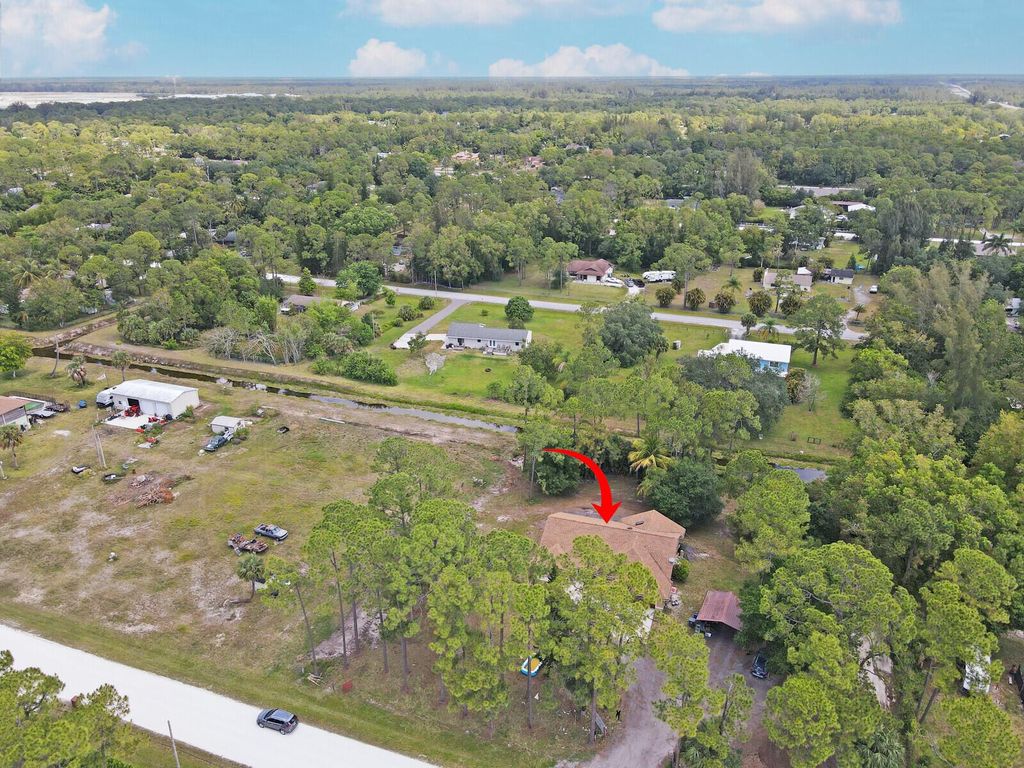 Photo of 13133 47th Court N, The Acreage, FL 33411 (MLS # R10983679)