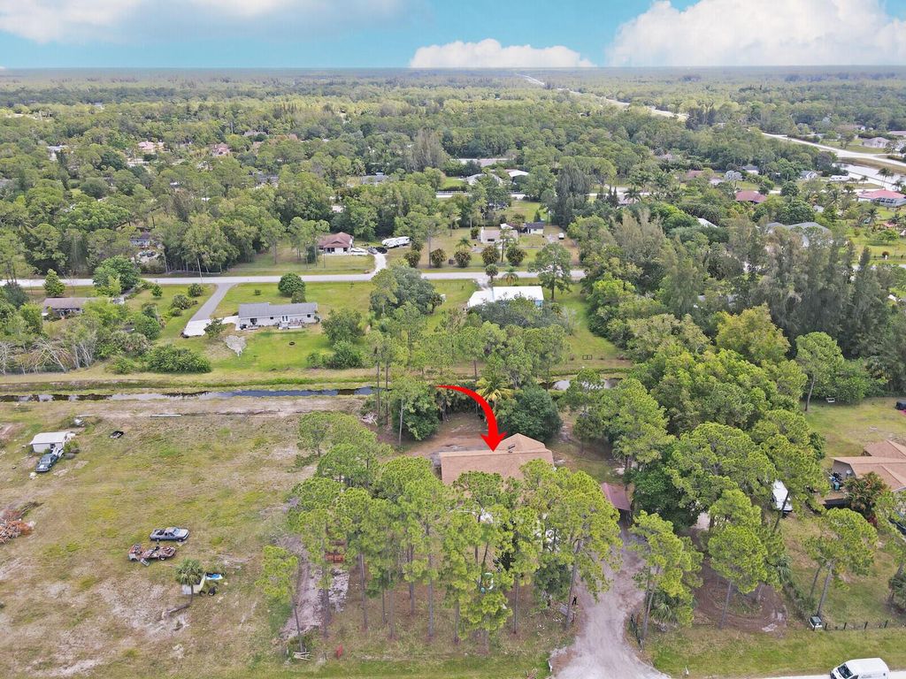 Photo of 13133 47th Court N, The Acreage, FL 33411 (MLS # R10983679)