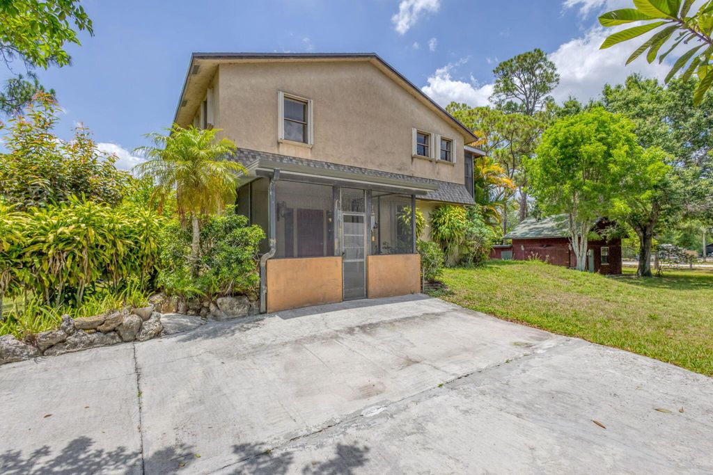 Photo of 13705 Persimmon Boulevard, The Acreage, FL 33411 (MLS # R11092127)