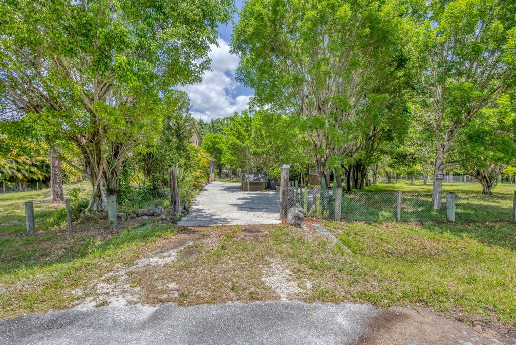 Photo of 13705 Persimmon Boulevard, The Acreage, FL 33411 (MLS # R11092127)