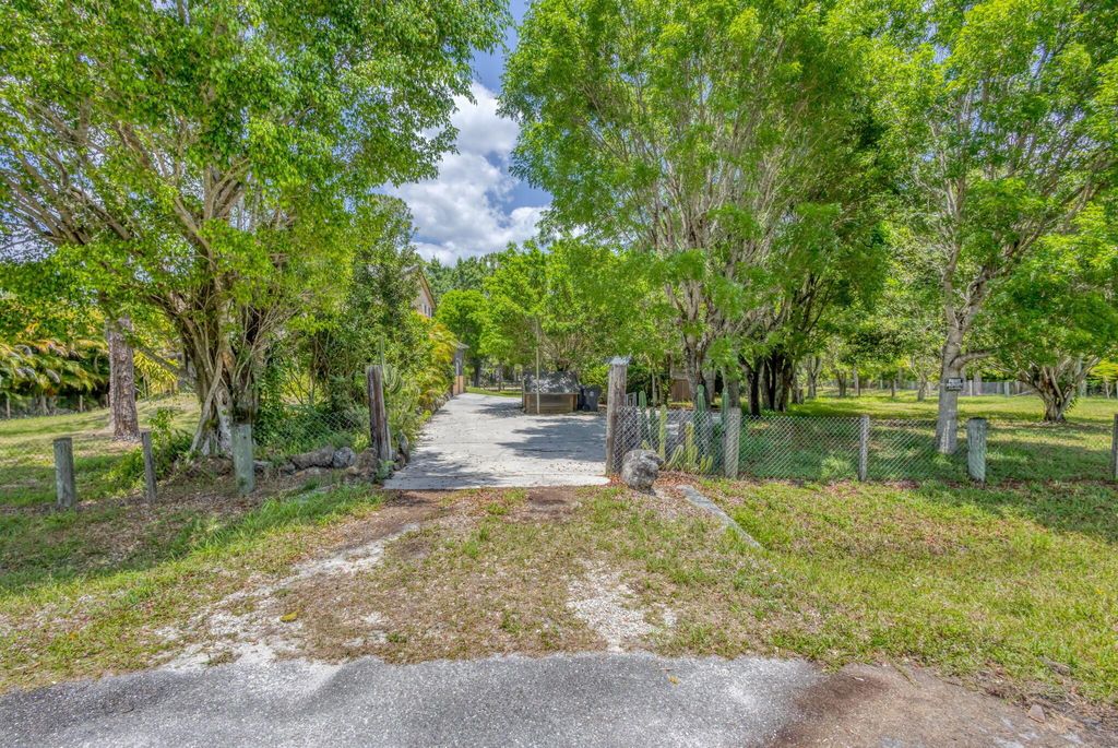 Photo of 13705 Persimmon Boulevard, The Acreage, FL 33411 (MLS # R11092127)