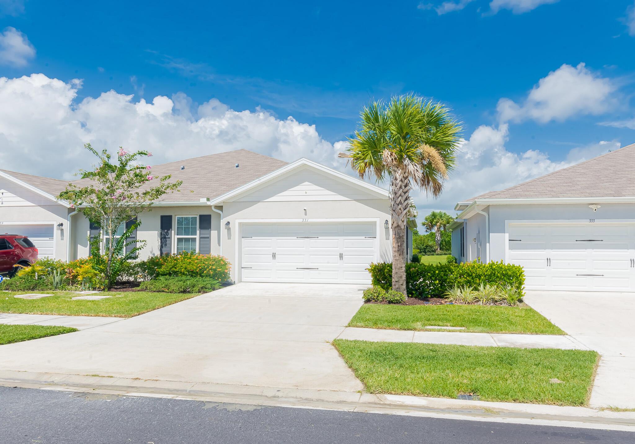 Avalon Crossing! Almost new 3/2/2 CBS Villa is available now. Tile floors in the main areas, great room, open floor plan. Kitchen has granite counters, plenty of wood cabinets, stainless appliances, pantry. Private backyard with covered and screened lanai. Over $20k in upgrades, freshly painted interior. Camera security system, smart doorbell included. HOA provides community pool, play area, lawn care. Easy commute to I95. Don't wait!
