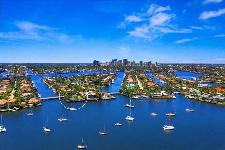 Amazing wide open Lake Sylvan views (opens to intracoastal) from trophy point lot. Highly desirable East exposure offers mesmerizing views & tropical breezes. Substantial sea wall with wide cap & multiple power pedestals. Dimensions: 100x143x100x129 total of 13,609 sq ft.Potential 229ft +/- dockage for large or multiple yachts.One of few vacant/buildable point lots available in Harbor Beach offering a private marina & surf club.