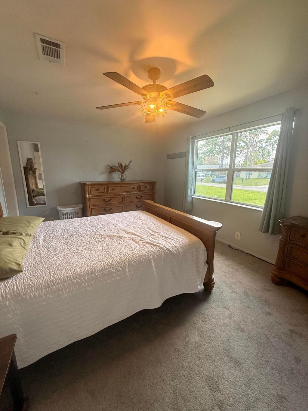 Photo of 1881 SE Manth Lane, Port Saint Lucie, FL 34983 (MLS # B26020870)