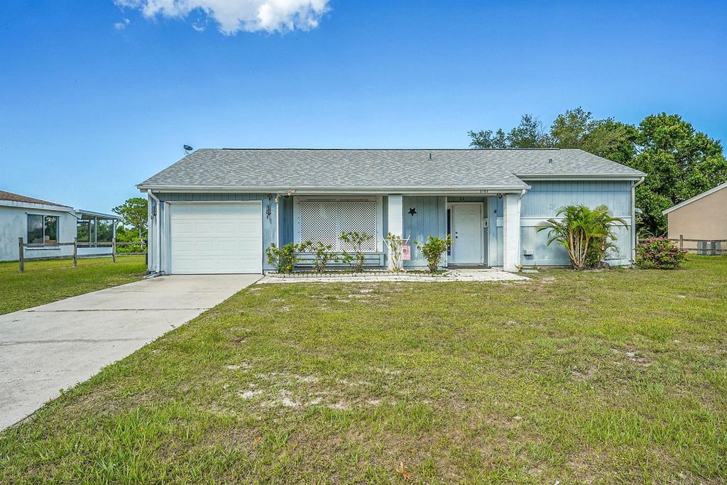 Photo of 1701 SE Burgundy Lane, Port Saint Lucie, FL 34952 (MLS # R11090620)