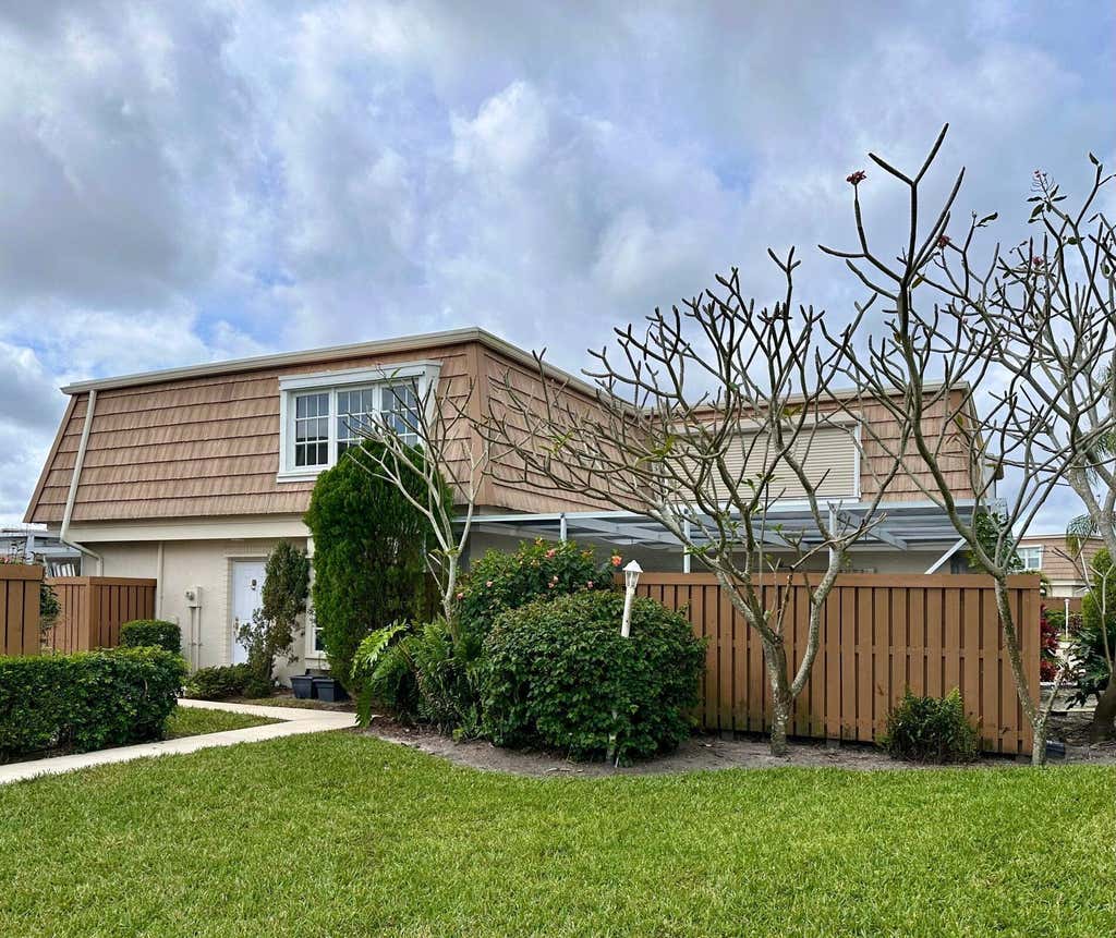 Photo of 11551 WINCHESTER Drive, Palm Beach Gardens, FL 33410 (MLS # B26062214)