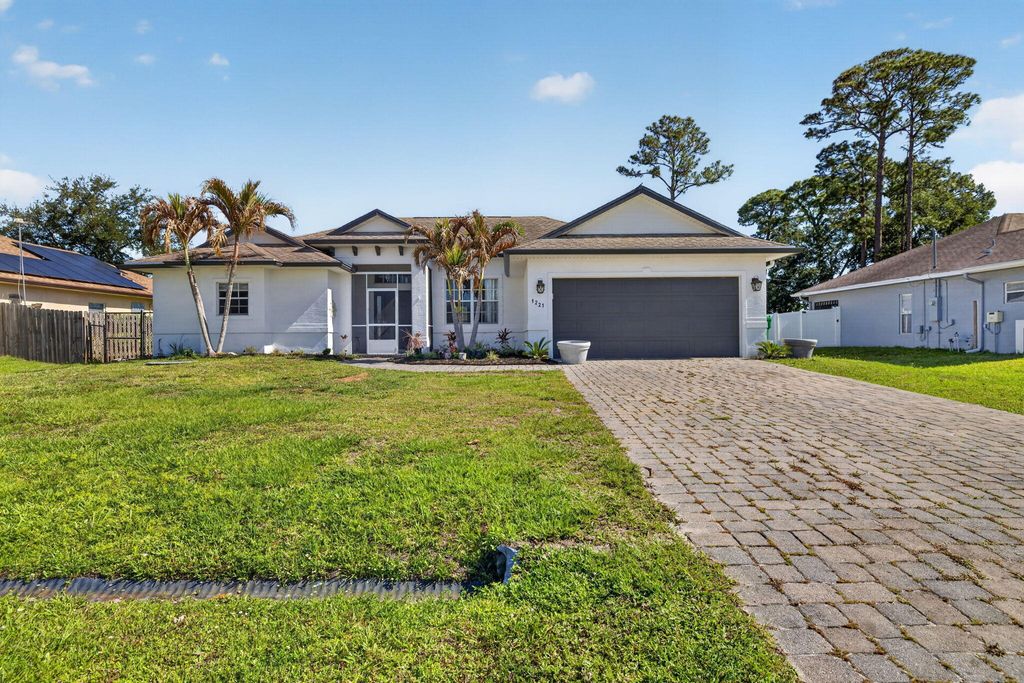 Photo of 1221 SW Wellington Avenue, Port Saint Lucie, FL 34953 (MLS # B26025782)