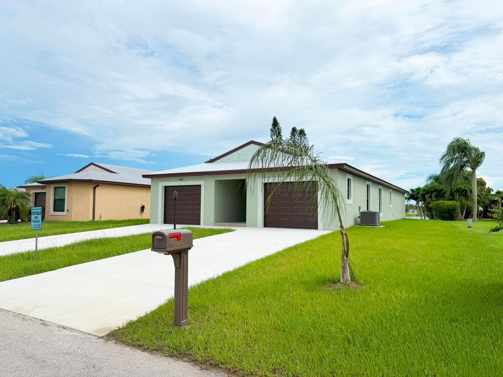 Photo of 141 Mediterranean Boulevard N, Port Saint Lucie, FL 34952 (MLS # R11121899)