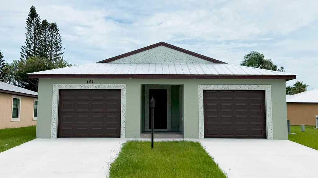 Photo of 141 Mediterranean Boulevard N, Port Saint Lucie, FL 34952 (MLS # R11121899)