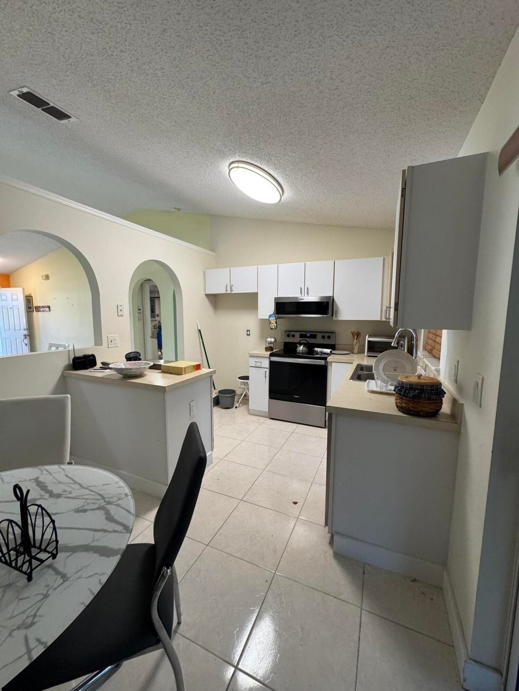 Photo of 1881 SW Agnes Street, Port Saint Lucie, FL 34953 (MLS # B26075170)