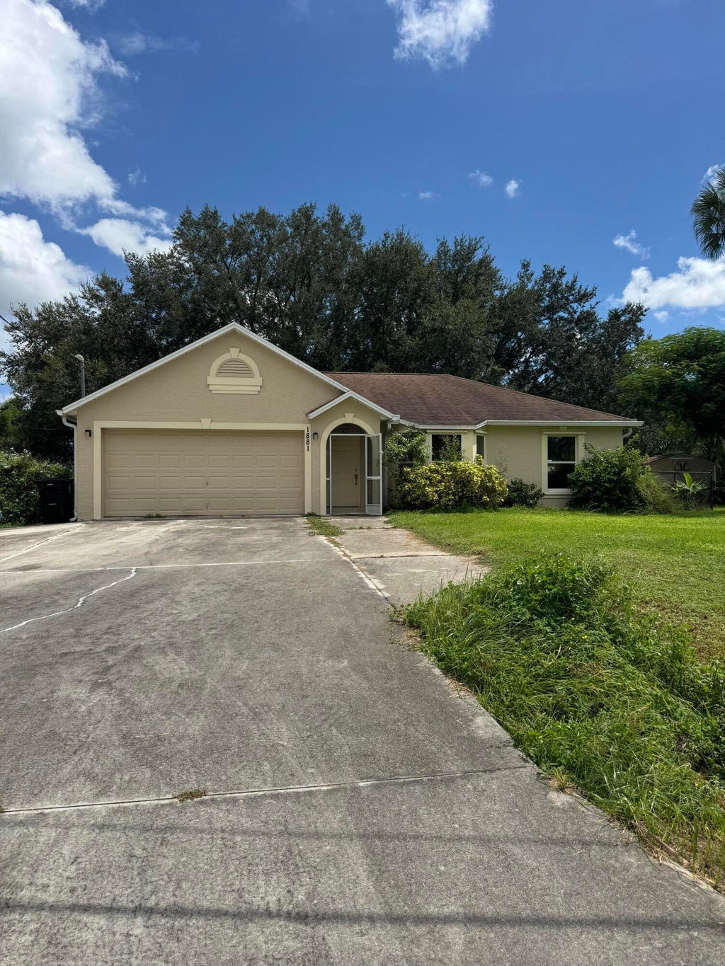 Photo of 1881 SW Agnes Street, Port Saint Lucie, FL 34953 (MLS # B26075170)