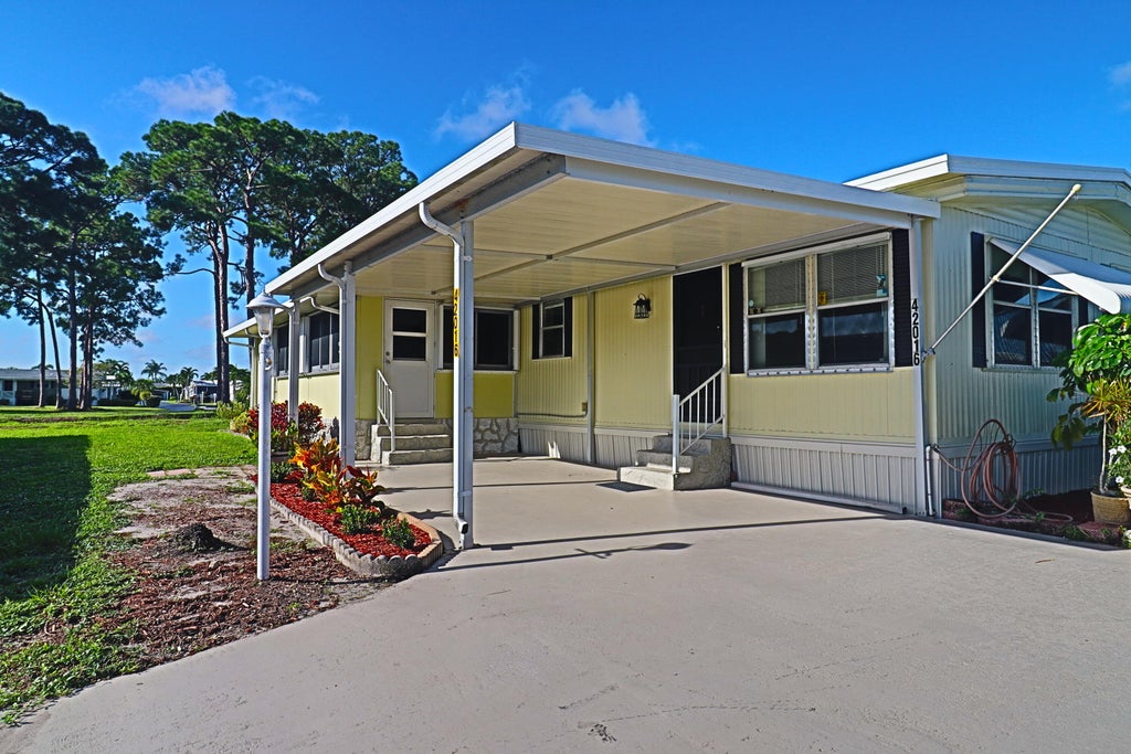 Photo of 42016 Jima Bay, Boynton Beach, FL 33436 (MLS # B26081130)