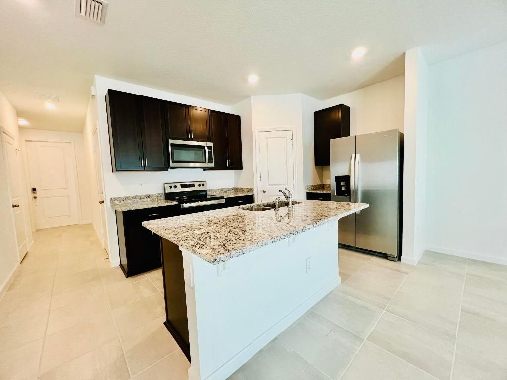 Photo of 418 Salisbury Circle, Fort Pierce, FL 34982 (MLS # R11026326)