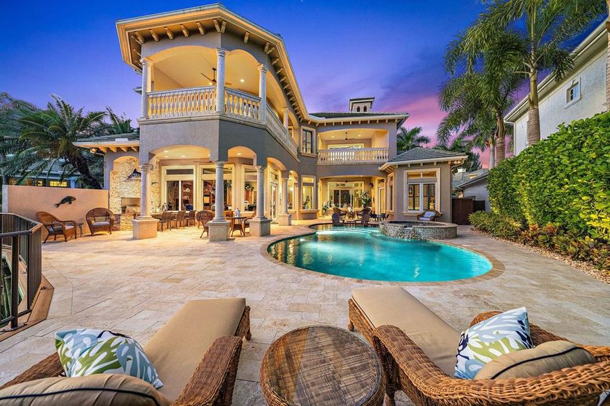 Welcome to The Harbour in Jonathans Landing! An intimate village of 11 homes ideally located within the community, the home provides 5 bedrooms, four and a half baths and 5,650 living square ft. A private view set back overlooking the 12th green along with a deeded 50' boat slip within a 5 minute walk, this is the perfect combination of the Florida lifestyle.