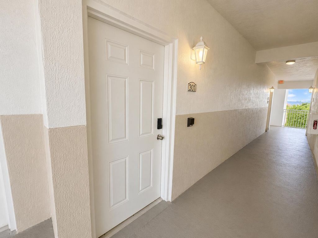 Photo of 11023 Legacy Lane #301, Palm Beach Gardens, FL 33410 (MLS # B26054383)