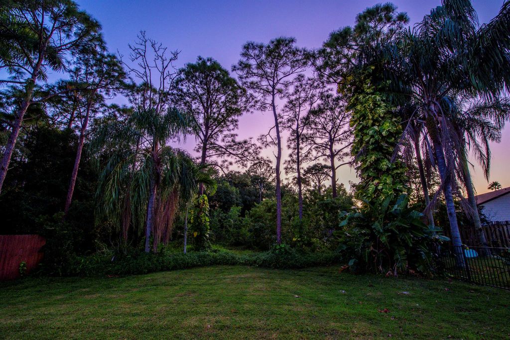 Photo of 6690 SE Raintree Avenue, Stuart, FL 34997 (MLS # R11141725)