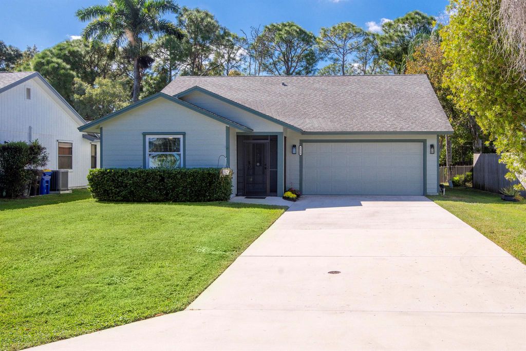 Photo of 6690 SE Raintree Avenue, Stuart, FL 34997 (MLS # R11141725)