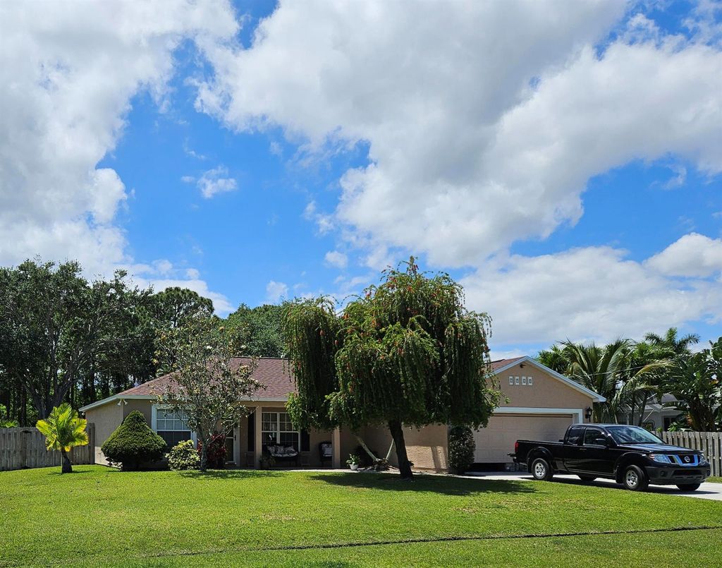 Photo of 1960 SE Bowie Street, Port Saint Lucie, FL 34952 (MLS # R10981409)