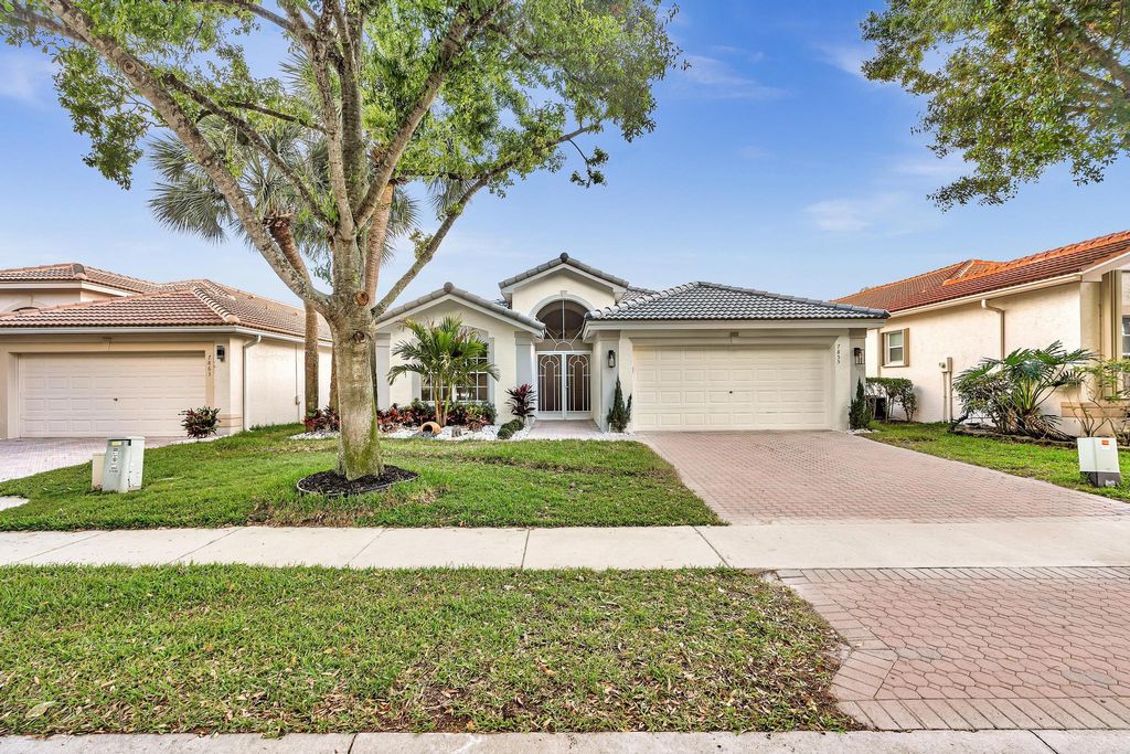 Photo of 7855 San Isidro Street, Boynton Beach, FL 33437 (MLS # B26008278)