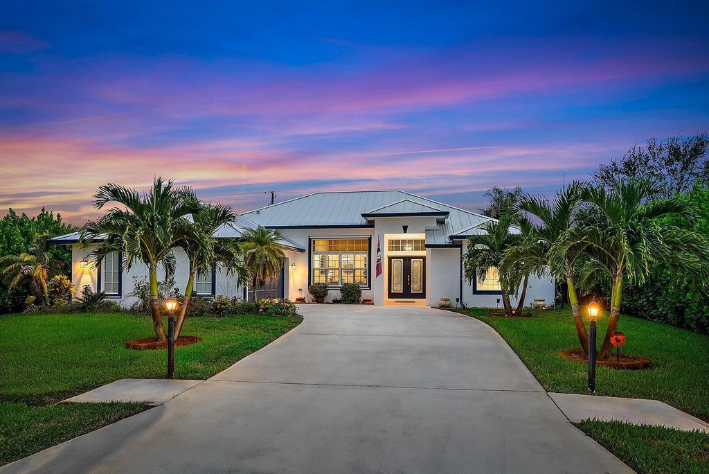 Photo of 381 SW Hollyhock Drive, Port Saint Lucie, FL 34953 (MLS # R11119095)