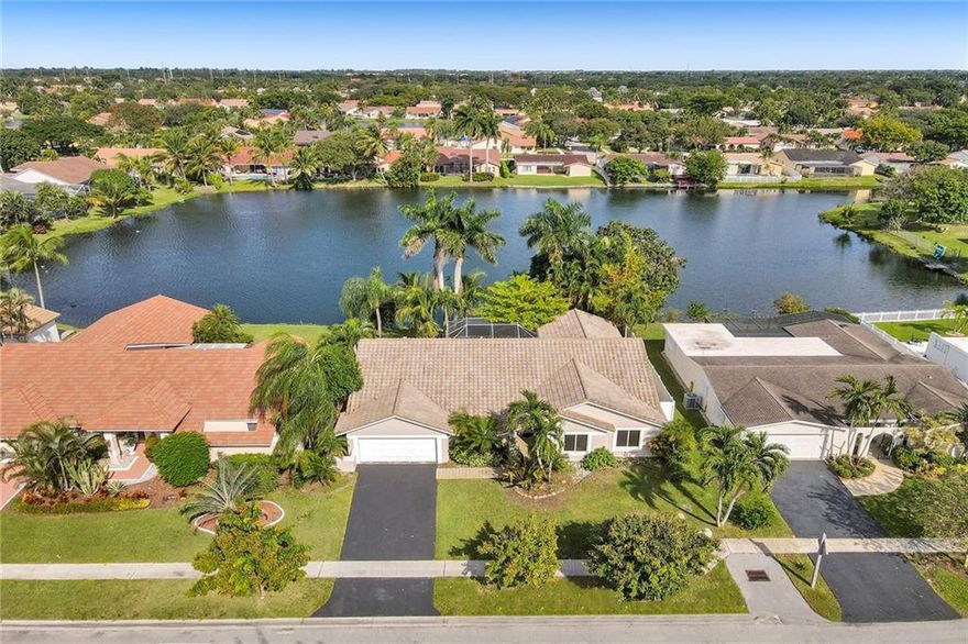 You will fall in love with this fully updated beautiful 4/2 lake view single family home in WestPort. This home has everything you wish for. 24" Marble floor throughout the living area and master bedroom.  Crystal Quartz Kitchen countertops. Italian hard wood floor in all the guest rooms. LED lights throughout the whole house. designer hardware in the bathrooms. Impact windows and doors. Roof is about 10 years old. Newer AC and lot more. Please see the feature sheet in the attachment. It's a dream home for you and your family. Quite and safe neiborghhood, close to all major highways, Fort Lauderdale airport, shopping centers and restaurants. Few minutes from American Heritage and Sawgrass Mall. Move in ready. Call today to arrange your private showing.  It won't last!!!