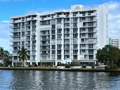 Spectacular views from this direct Intracoastal waterfront unit. Large 28' wraparound balcony (SW corner unit) gives you panoramic sunsets, constant boat activity and even a glimpse of the ocean. Check out the largest floor plan in this meticulously maintained friendly building. Sleek appliances adorn the kitchen with a tray ceiling and recessed lights. Spacious 2 bedrooms and fully upgraded bathrooms are waiting for your arrival. A full view glass entry door gives you beautiful sunrises overlooking the ocean facing East. A minimum lease of 6 months, commencing ASAP and extending through August 31st, 2026. Extended terms possible. Have the best of both worlds where you're directly on the ICW, steps away from pristine beaches. The pool and Grotto are perfect for waterside entertaining.