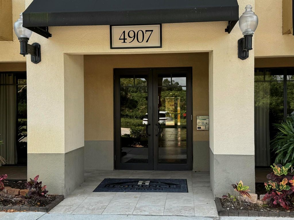 Photo of 4907 Midtown Lane #1415, Palm Beach Gardens, FL 33418 (MLS # R11080422)