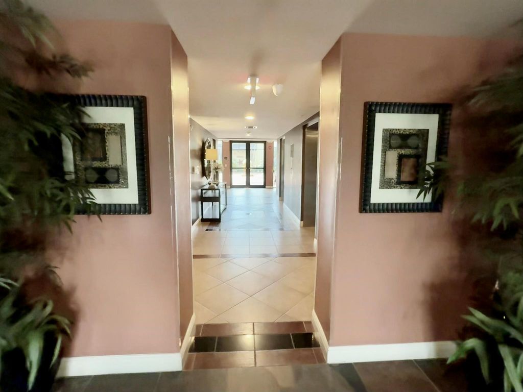 Photo of 4907 Midtown Lane #1415, Palm Beach Gardens, FL 33418 (MLS # R11080422)