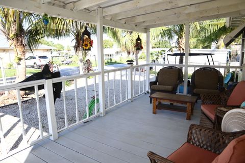 Tiny photo for 1099 7th Street, Okeechobee, FL 34974 (MLS # B26037231)