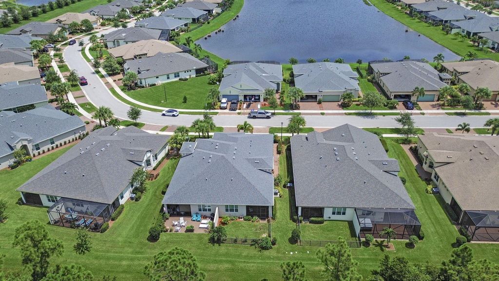 Photo of 12898 SW Lake Fern Circle, Port Saint Lucie, FL 34987 (MLS # B26008213)
