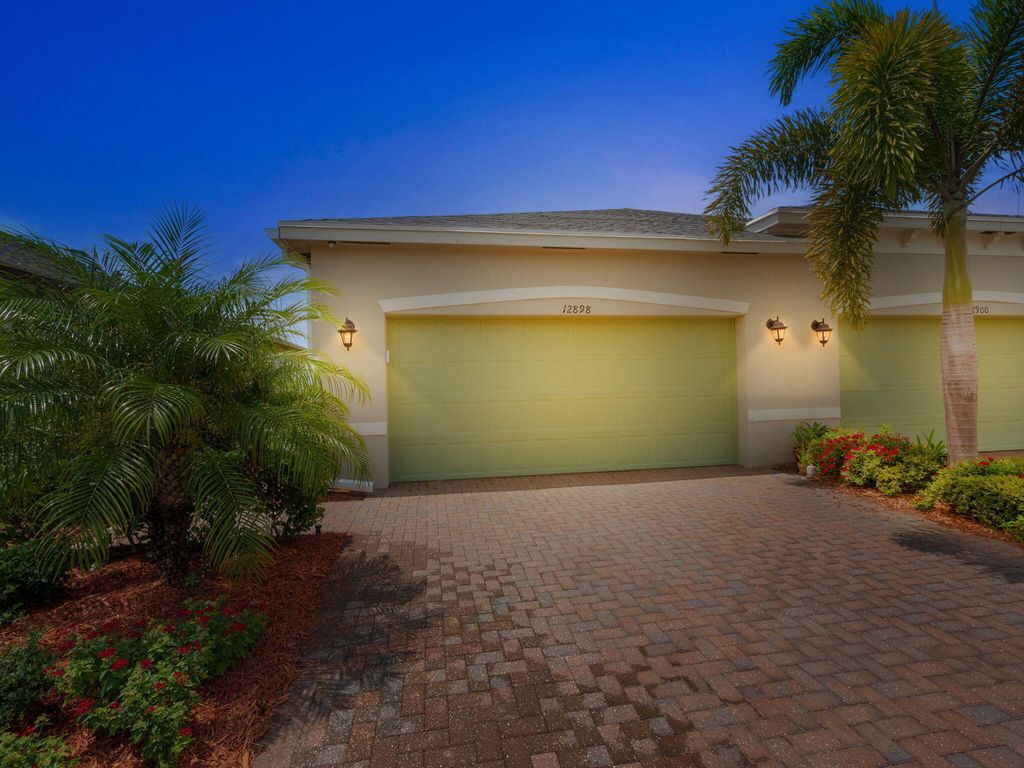 Photo of 12898 SW Lake Fern Circle, Port Saint Lucie, FL 34987 (MLS # B26008213)