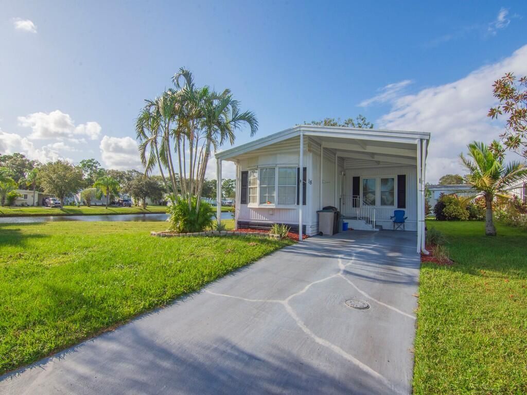 Photo of 18 Yolanda Lane, Port Saint Lucie, FL 34952 (MLS # R11033112)
