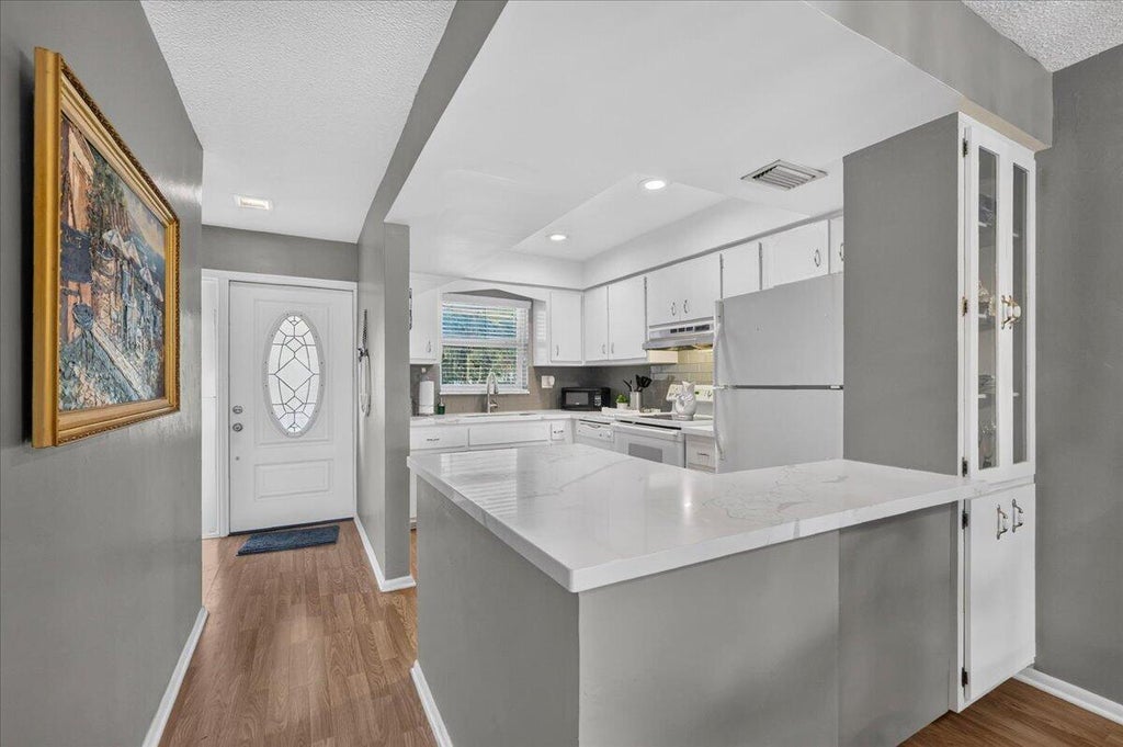 Photo of 333 NE 19TH Avenue #203, Deerfield Beach, FL 33441 (MLS # B26086917)