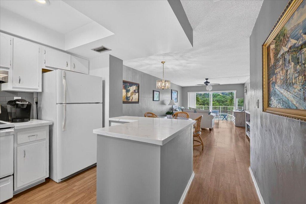 Photo of 333 NE 19TH Avenue #203, Deerfield Beach, FL 33441 (MLS # B26086917)