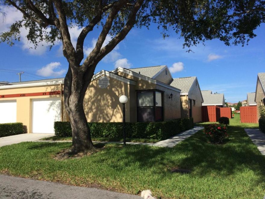 Three bedroom villa with an attached covered patio, a one car garage and a large fenced back yard. Floor plan offers 1,278 living s.f, freshly painted interior, newer A/C, and a new flat roof on the garage. Interior features a split floor plan with ceramic tile throughout, vaulted ceilings, an eat-in kitchen, & a spacious open living & dining area with access to the covered patio. Master suite has a walk-in closet, and a full en-suite bathroom. Guest bedrooms are on the opposite side of the home & share a