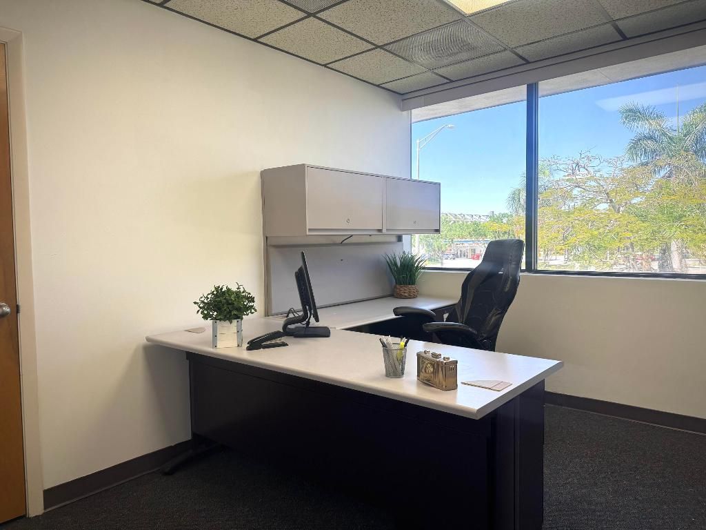 Photo of 4119 W Blue Heron Boulevard #30, Riviera Beach, FL 33404 (MLS # R11076674)