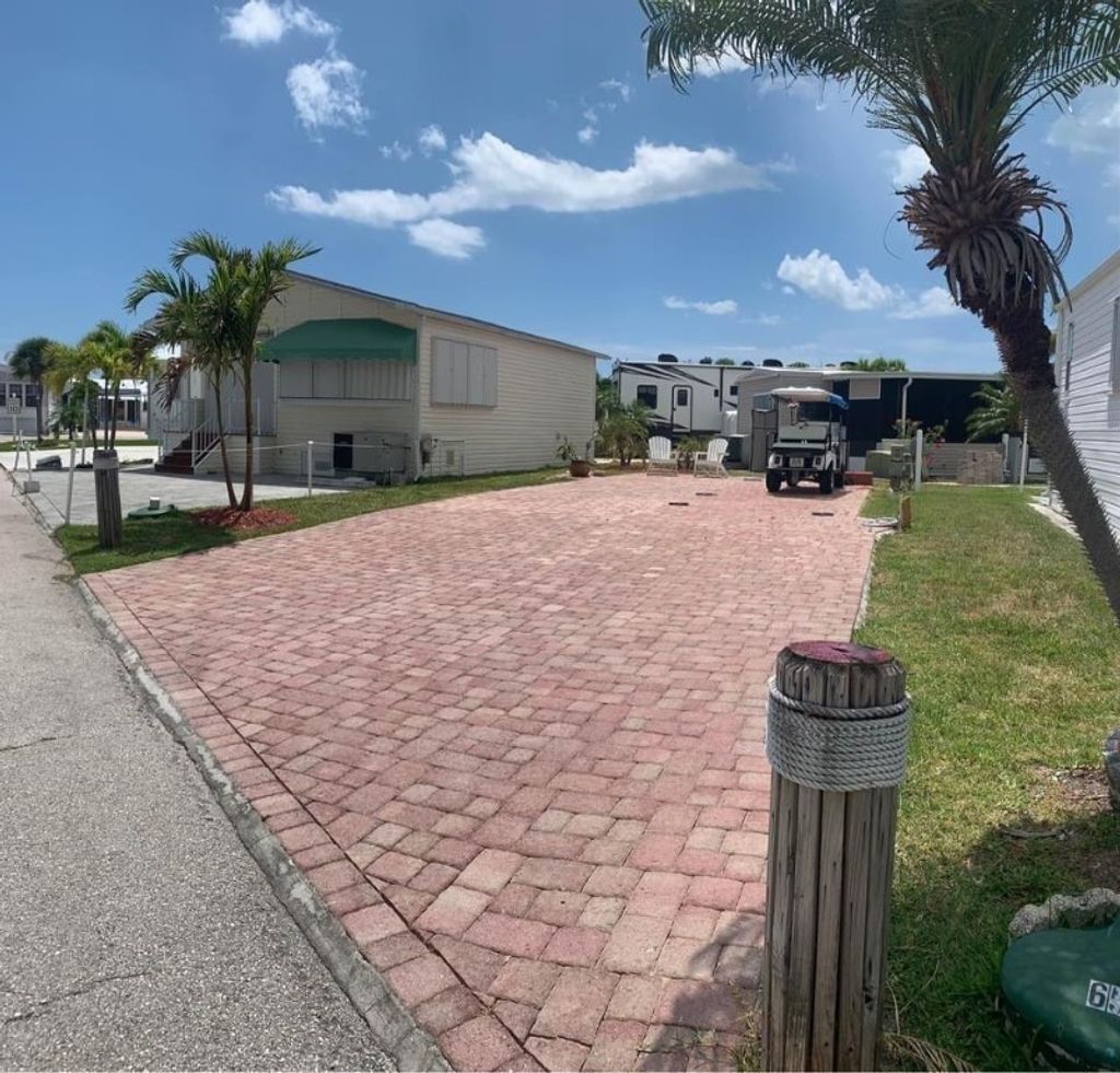 Photo of 651 Nettles Boulevard, Jensen Beach, FL 34957 (MLS # F10326620)