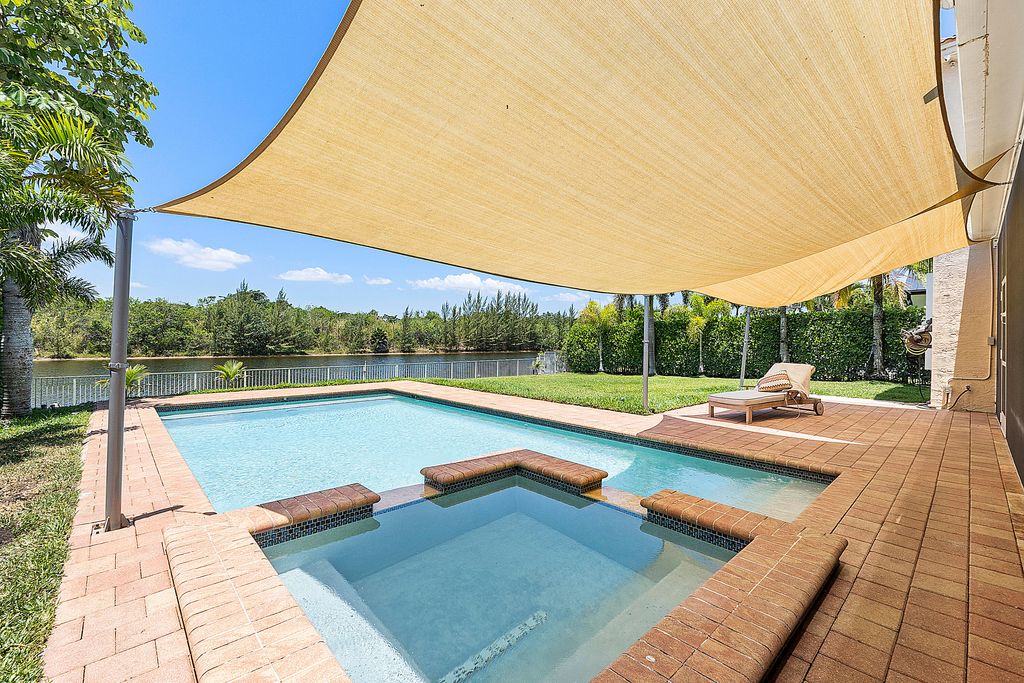 Photo of 5318 SW 195th Terrace, Miramar, FL 33029 (MLS # R10987466)