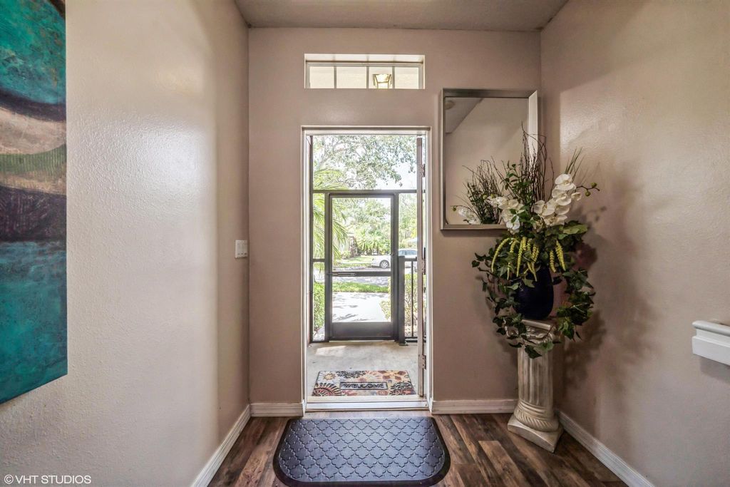 Photo of 1945 SE Interlachen Drive, Port Saint Lucie, FL 34952 (MLS # R10980182)