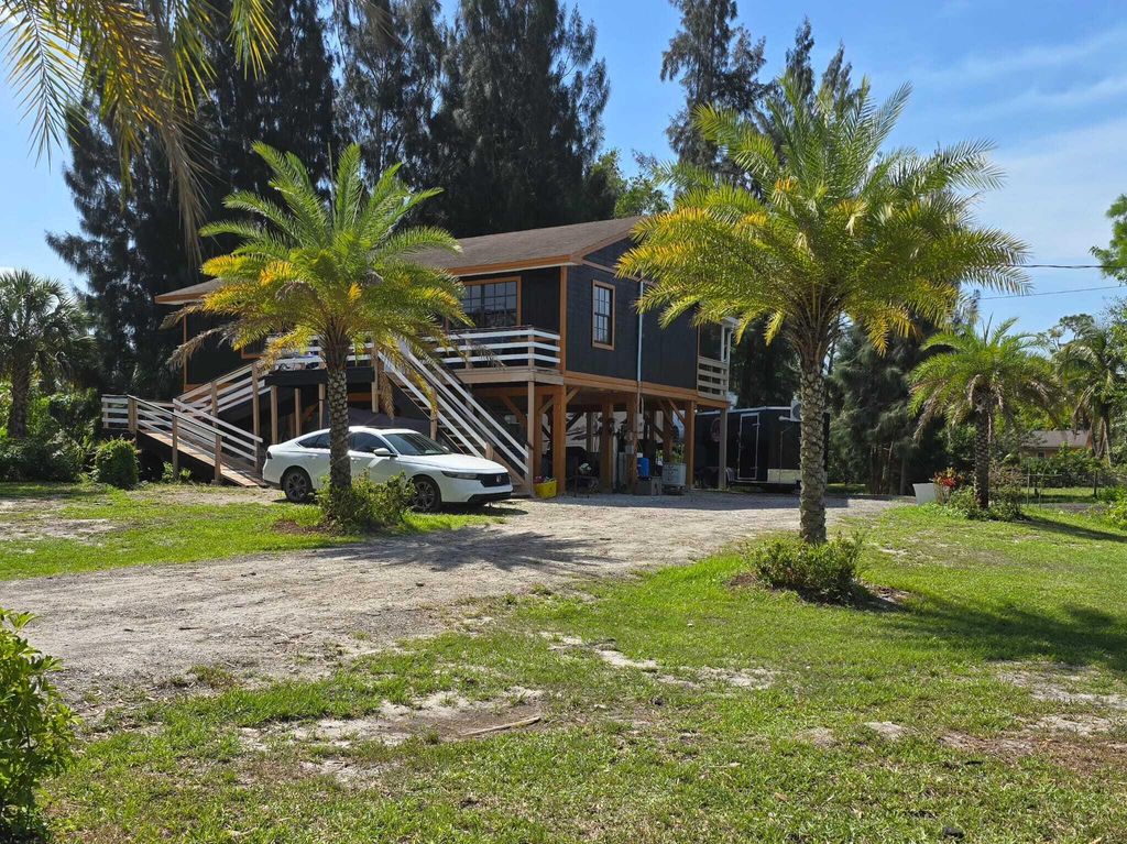 Photo of 16318 E Pimlico Drive, The Acreage, FL 33470 (MLS # R11083865)