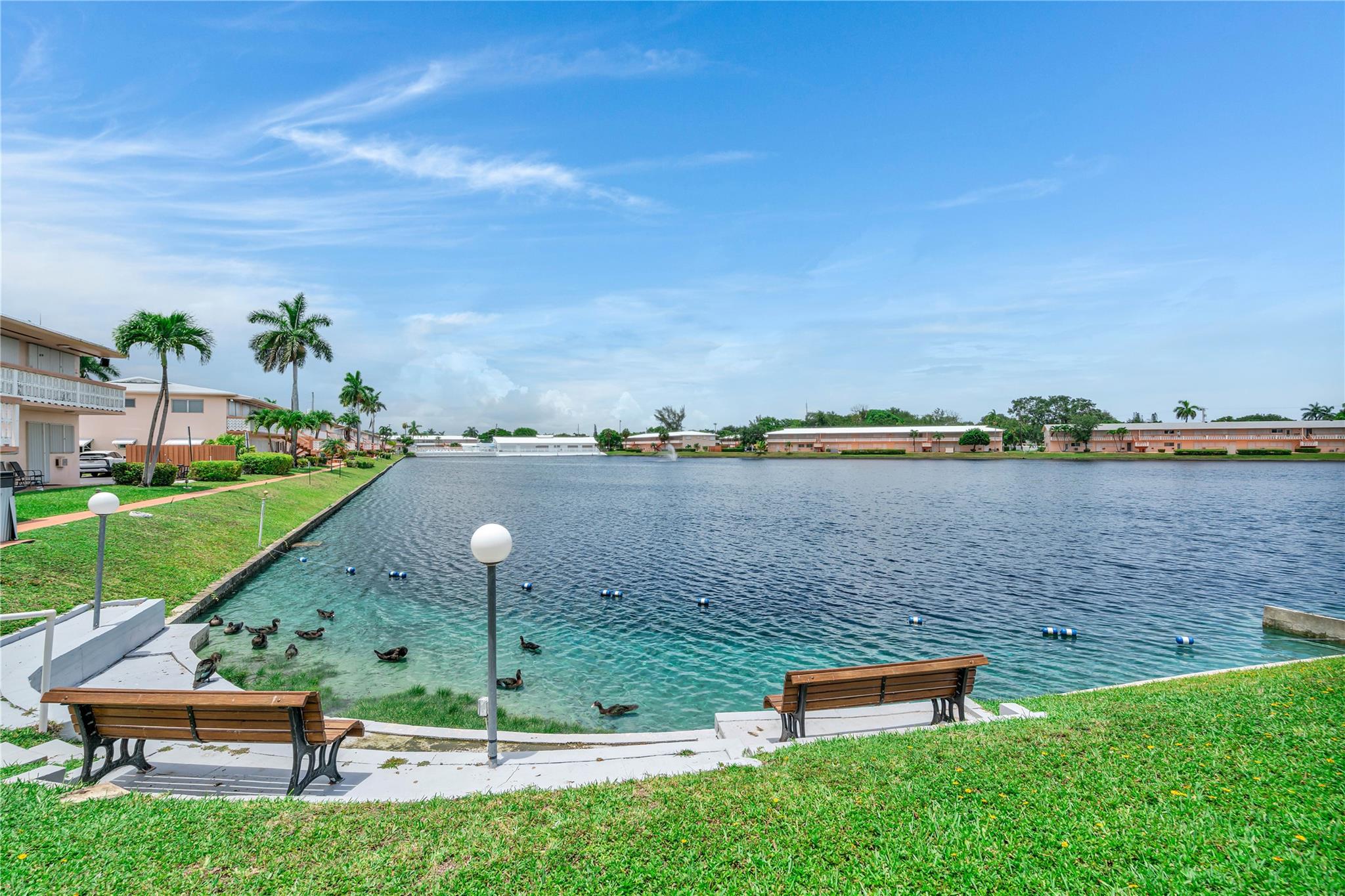 First-floor corner unit with a stunning lake view, fully furnished and featuring an updated kitchen with granite countertops. Includes impact windows and a newer A/C for added comfort. Located in a wonderful community featuring a pool with beautiful lake views, shuffleboard, clubhouse, organized activities, and more. Conveniently close to shopping, restaurants, and public transportation.