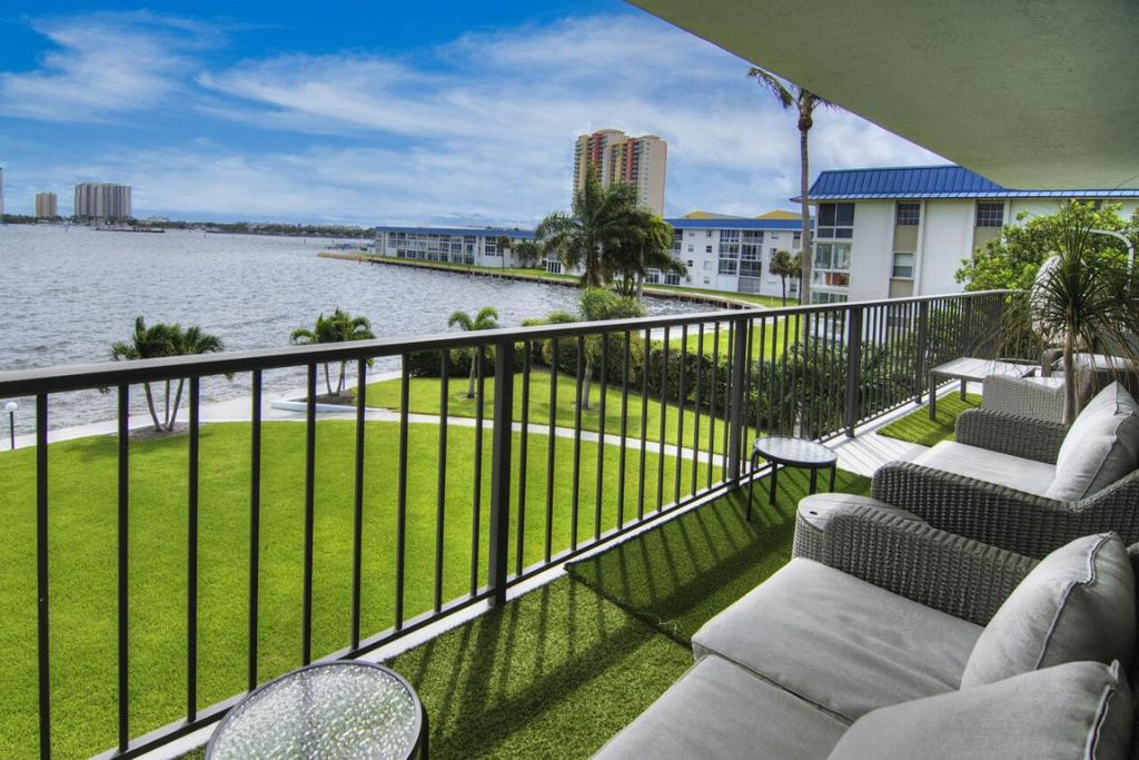 Photo of 3040 Lake Shore Drive #305, Riviera Beach, FL 33404 (MLS # R11126175)