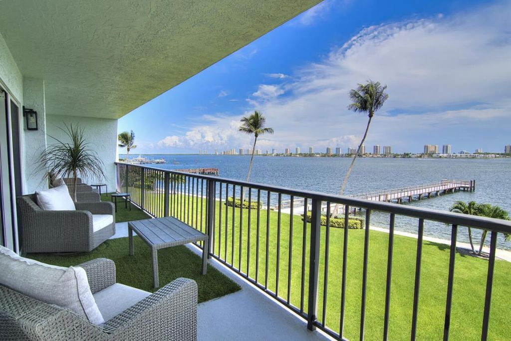 Photo of 3040 Lake Shore Drive #305, Riviera Beach, FL 33404 (MLS # R11126175)