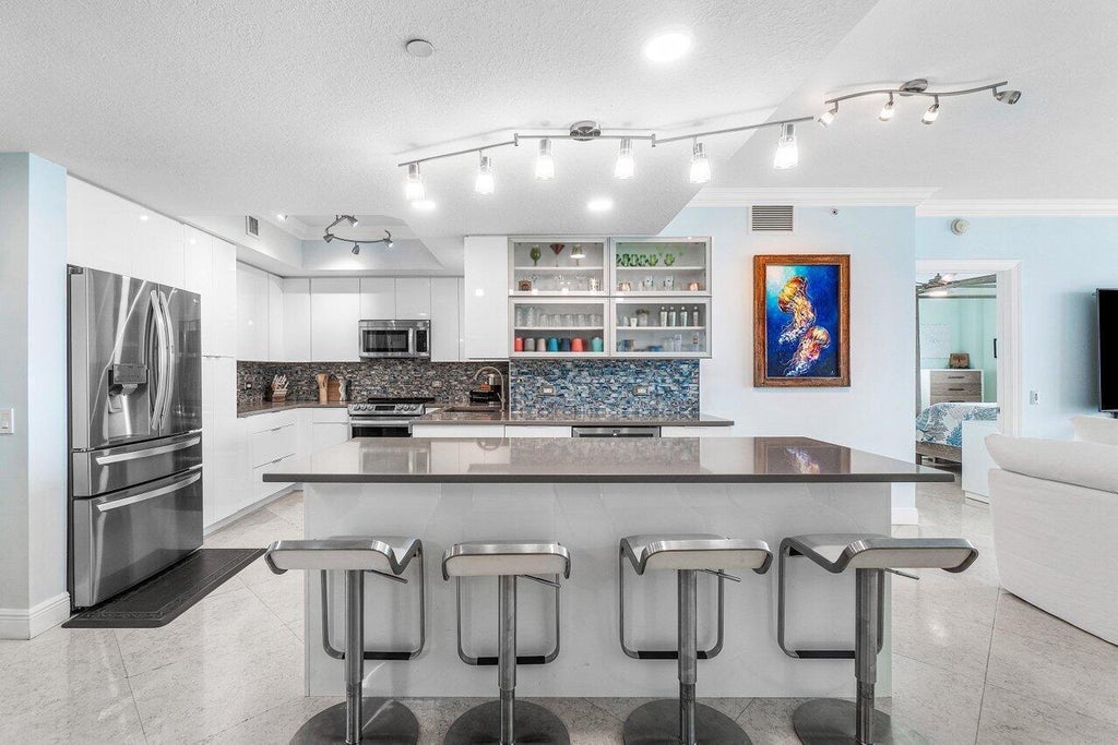 Photo of 2650 Lake Shore Drive #701, West Palm Beach, FL 33404 (MLS # B26013457)