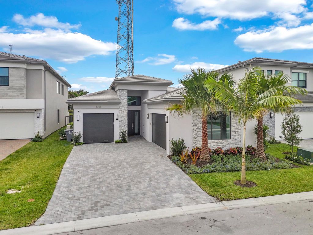 Photo of 8228 Essex Country Club Drive, Boca Raton, FL 33434 (MLS # R11062808)