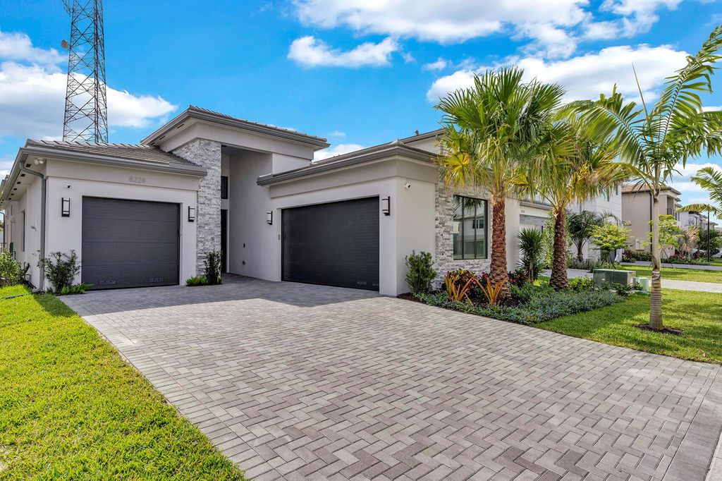 Photo of 8228 Essex Country Club Drive, Boca Raton, FL 33434 (MLS # R11062808)