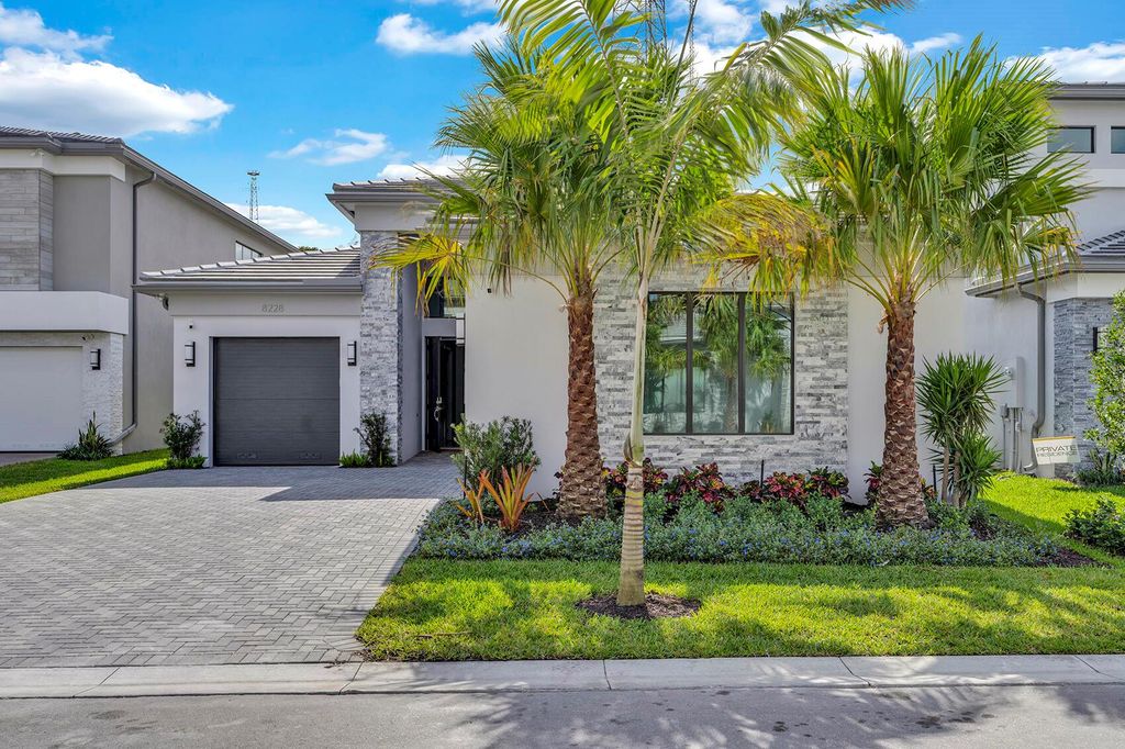 Photo of 8228 Essex Country Club Drive, Boca Raton, FL 33434 (MLS # R11062808)