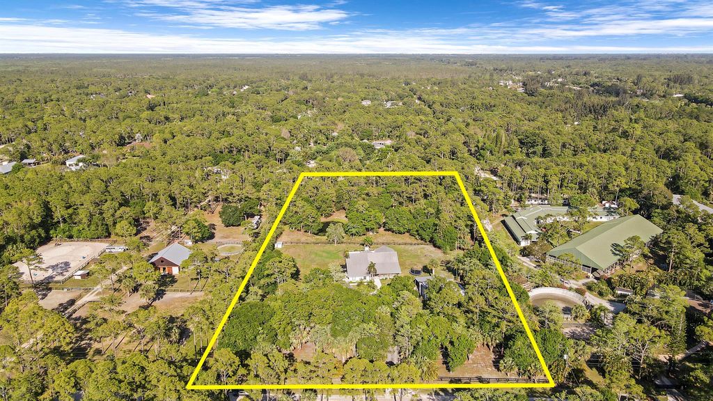 Photo of 18300 Windsong Way, Jupiter, FL 33478 (MLS # R10883629)